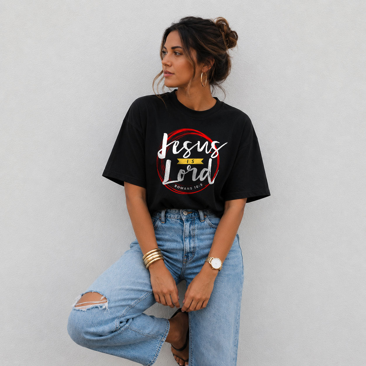 Unisex Softstyle T-Shirt by Printify featuring a "Jesus is Lord" graphic in black text on a white cotton fabric.