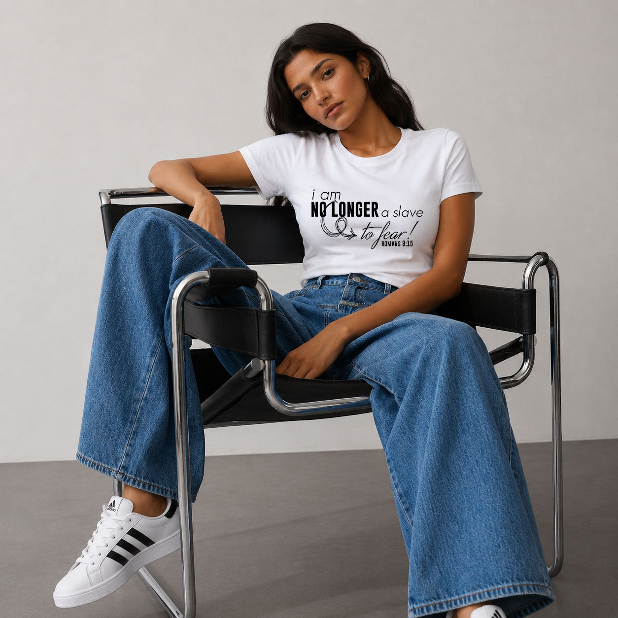 Women's softstyle T-shirt by Printify featuring the "I am No Longer A Slave to Fear" design, shown on a model.