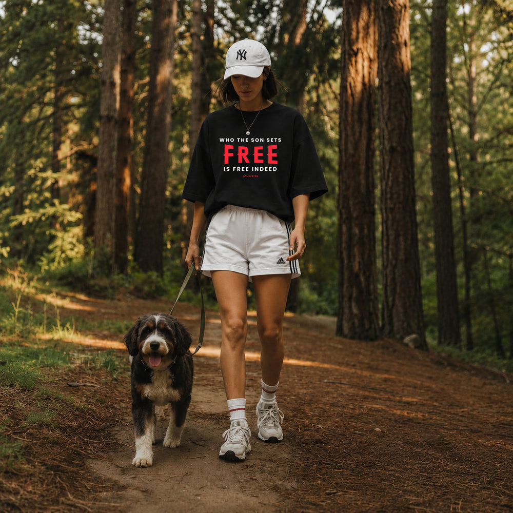 Unisex softstyle T-shirt with "Who the Son Sets Free is Free Indeed" print, featuring a comfortable fit and vibrant design.