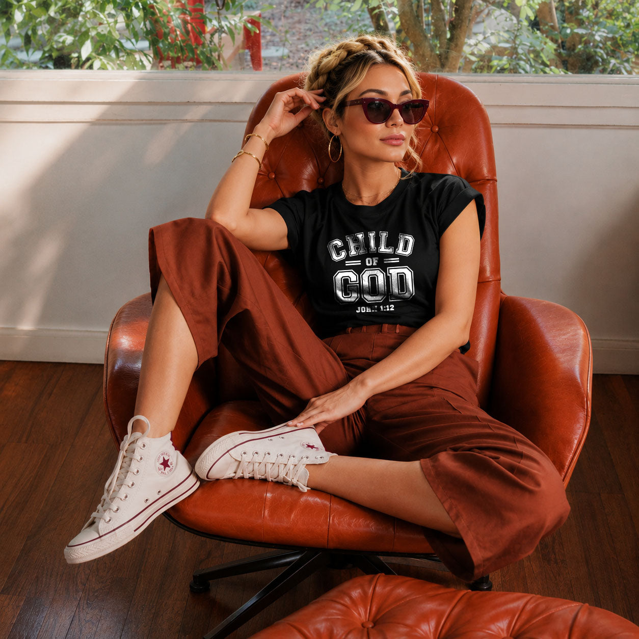 Unisex softstyle T-shirt by Printify featuring a "Child of God" design, shown in a casual fit with graphic print on front.
