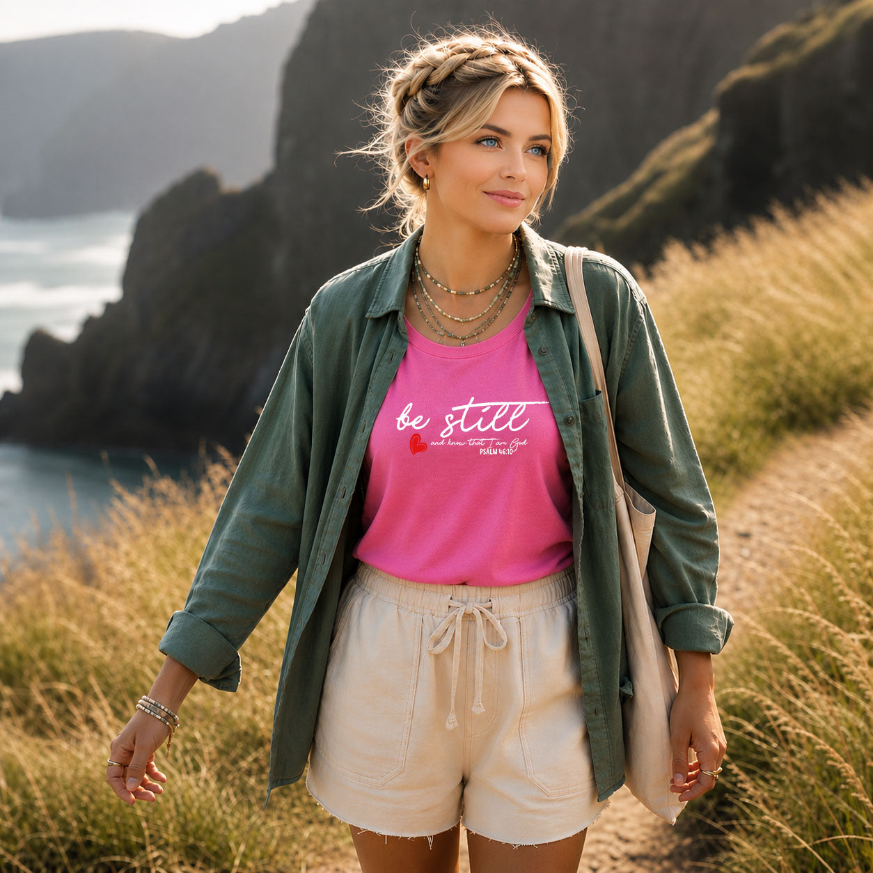 Women's softstyle T-shirt by Printify featuring a "Be Still" design, shown in a relaxed fit with short sleeves and simple style.