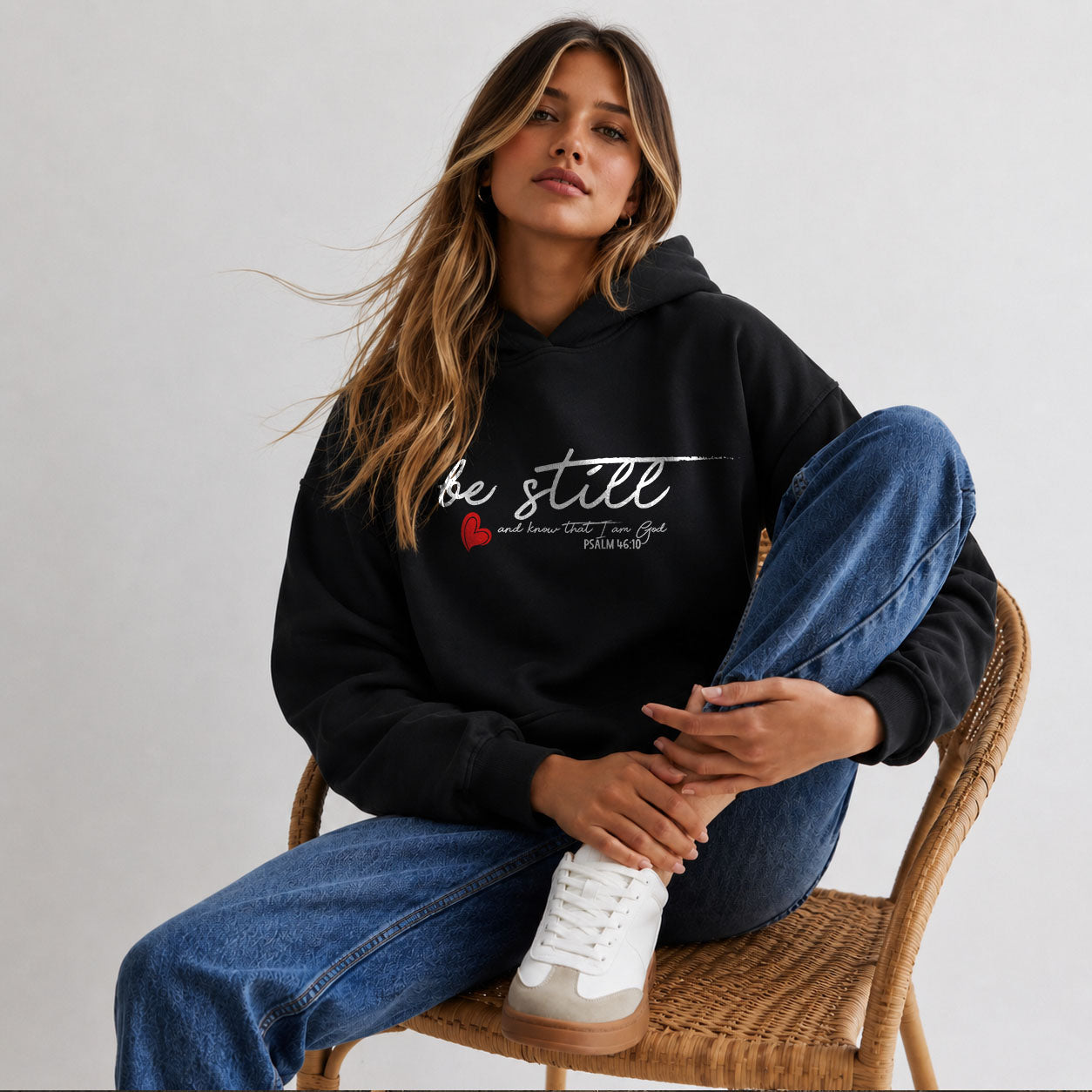 Unisex heavy blend hooded sweatshirt with "Be Still" print, casual hoodie style by Printify, shown in the image.