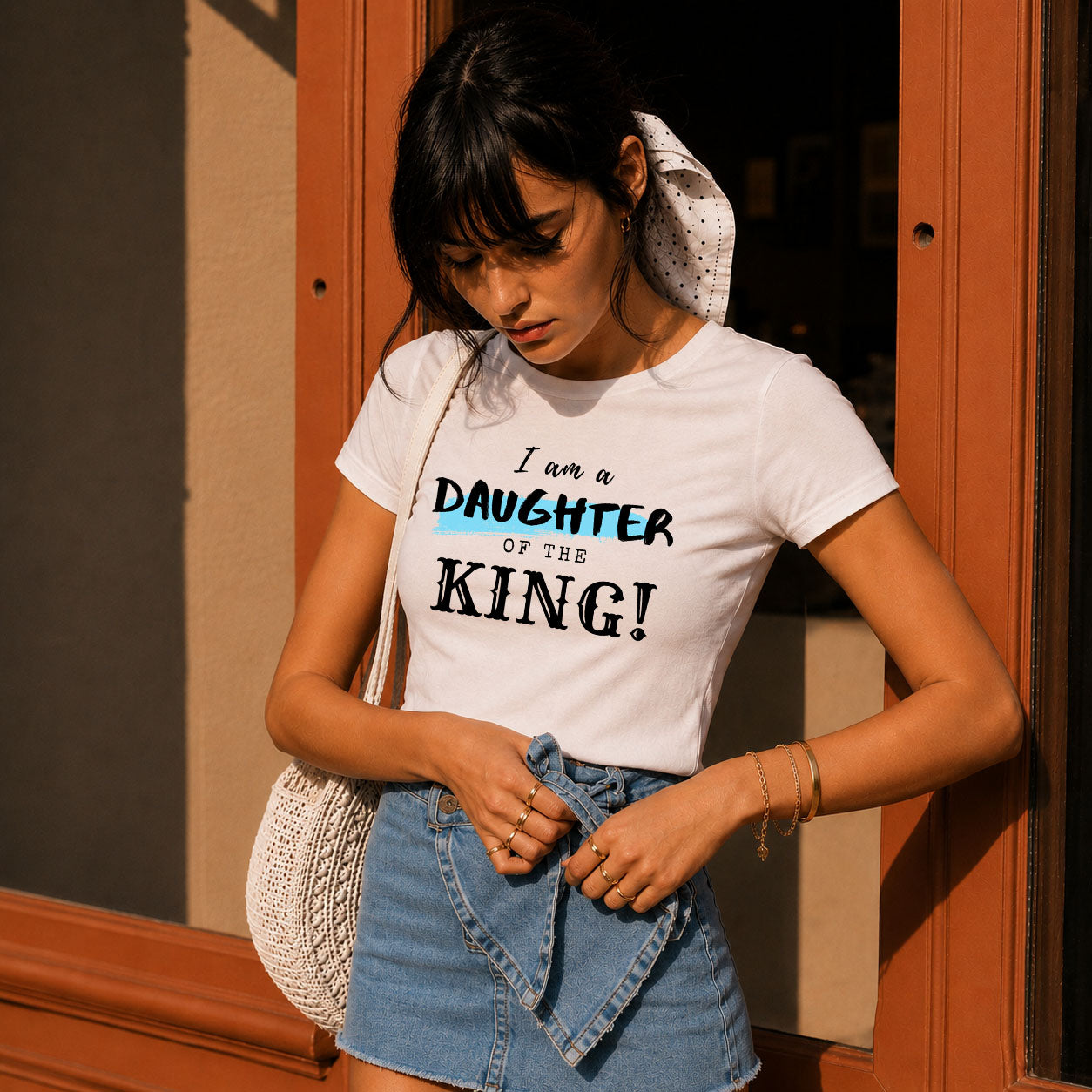 Women's softstyle T-shirt with "I am a Daughter of the King" print, featuring a comfortable fit and stylish design.