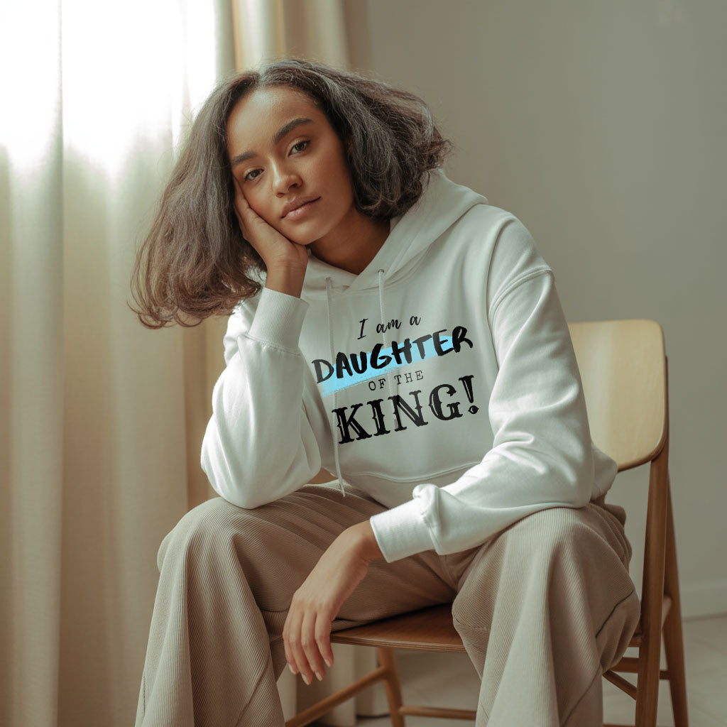 Unisex Heavy Blend™ hoodie by Printify featuring the "I Am a Daughter of the King" design in black and white, with a drawstring hood.