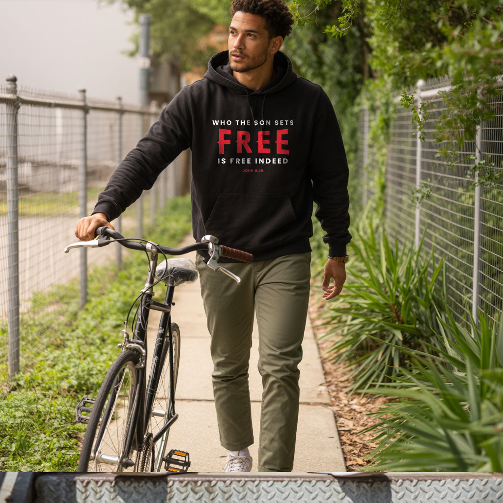Unisex Heavy Blend hoodie featuring "Who the Son Sets Free is Free Indeed" text, in black with front pocket and hood.
