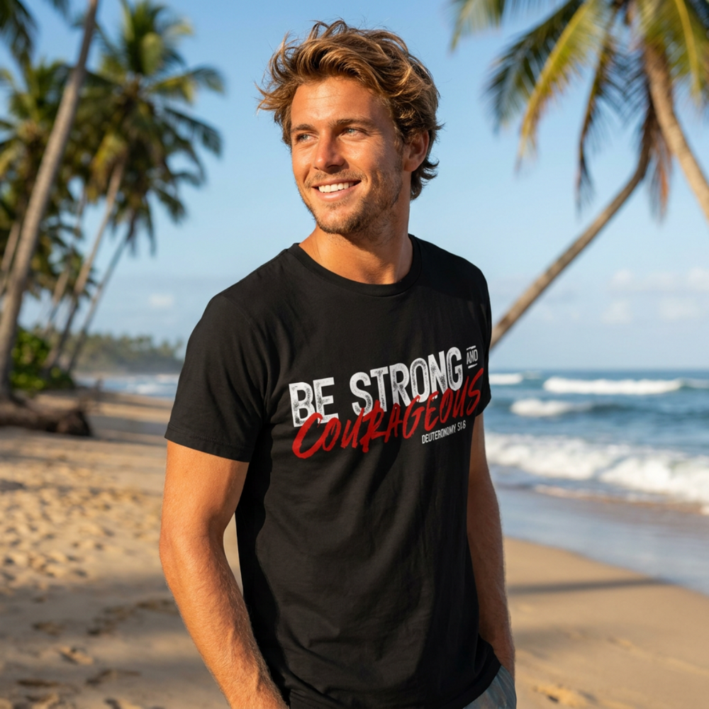 Unisex softstyle T-shirt by Printify with "Be Strong and Courageous" slogan, showing the comfortable fabric and printed design.