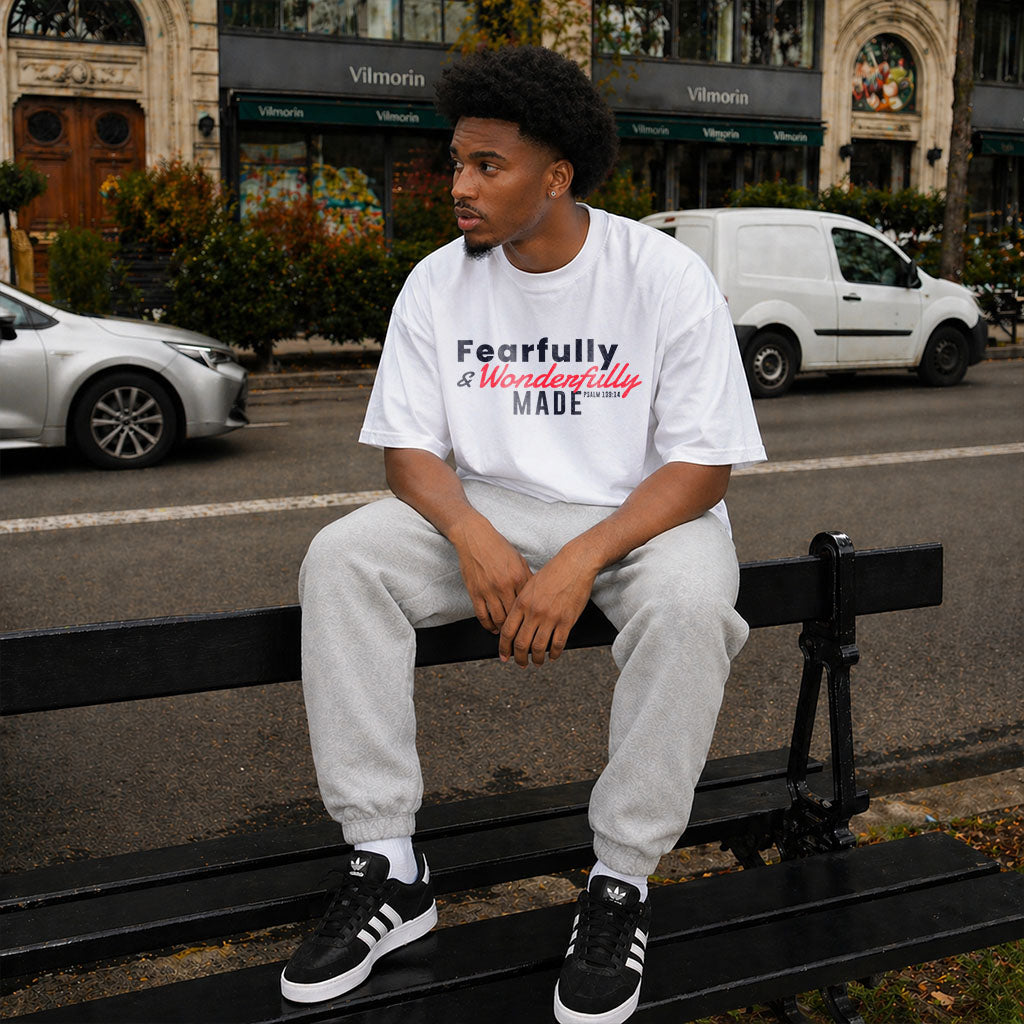Unisex Softstyle T-Shirt by Printify featuring the "Fearfully and Wonderfully Made" design, shown with a relaxed fit and soft fabric.