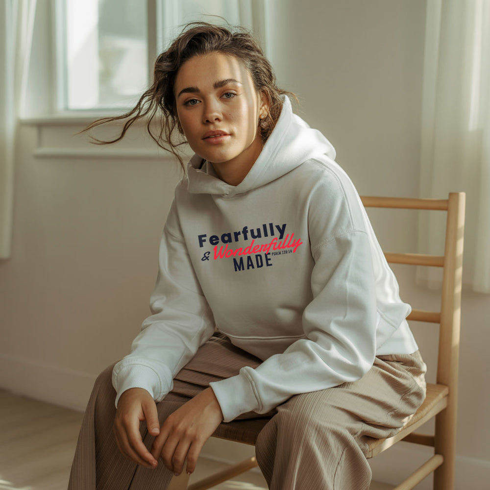 Unisex Heavy Blend™ hoodie with "Fearfully and Wonderfully Made" print, featuring a front pocket and hood, by Printify.