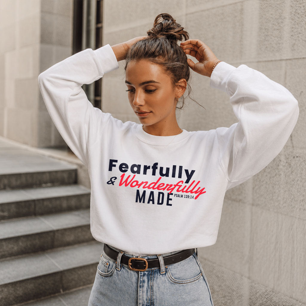 Unisex midweight softstyle fleece crewneck sweatshirt with "Fearfully and Wonderfully Made" print, by Printify.