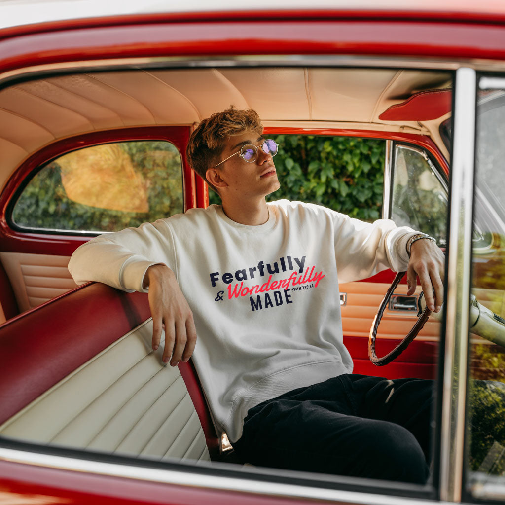 Unisex midweight softstyle fleece crewneck sweatshirt with "Fearfully and Wonderfully Made" print, by Printify.