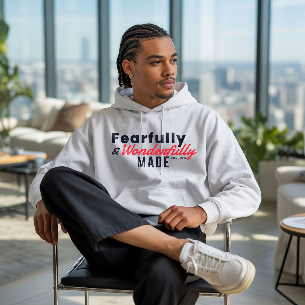 Unisex Heavy Blend™ Hoodie by Printify featuring "Fearfully and Wonderfully Made" text on front, in black with a drawstring hood.