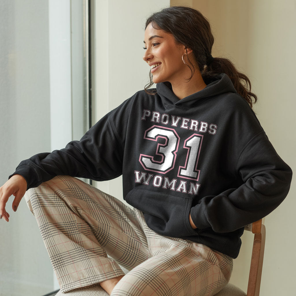 Unisex Heavy Blend™ Hoodie featuring Proverbs 31 Woman design by Printify, showing a gray hoodie with printed text and front pocket.