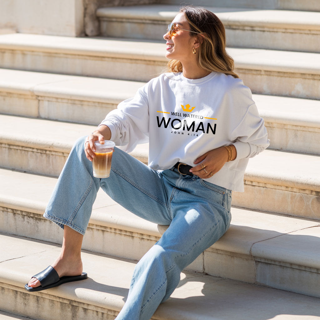 Unisex midweight softstyle fleece crewneck sweatshirt featuring a well-watered woman design by Printify, shown in black fabric.
