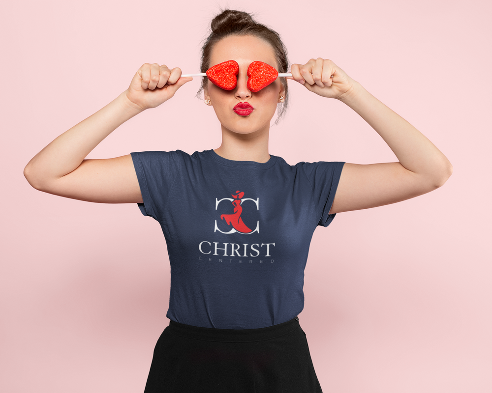 Playful girl wearing Lady CC Women's Softstyle Tee with "God’s Masterpiece" print, perfect for Valentine's Day.